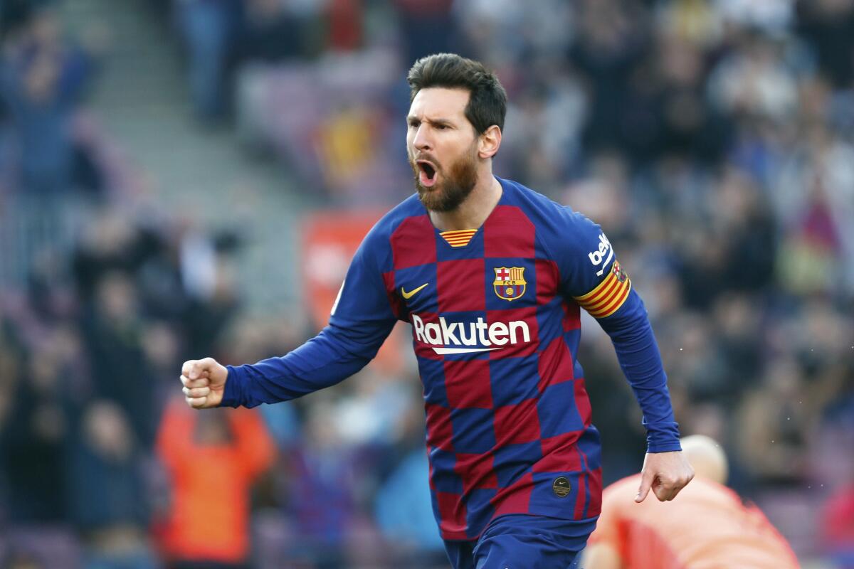 Lionel Messi celebrates after scoring for Barcelona during a game on May 23, 2020.