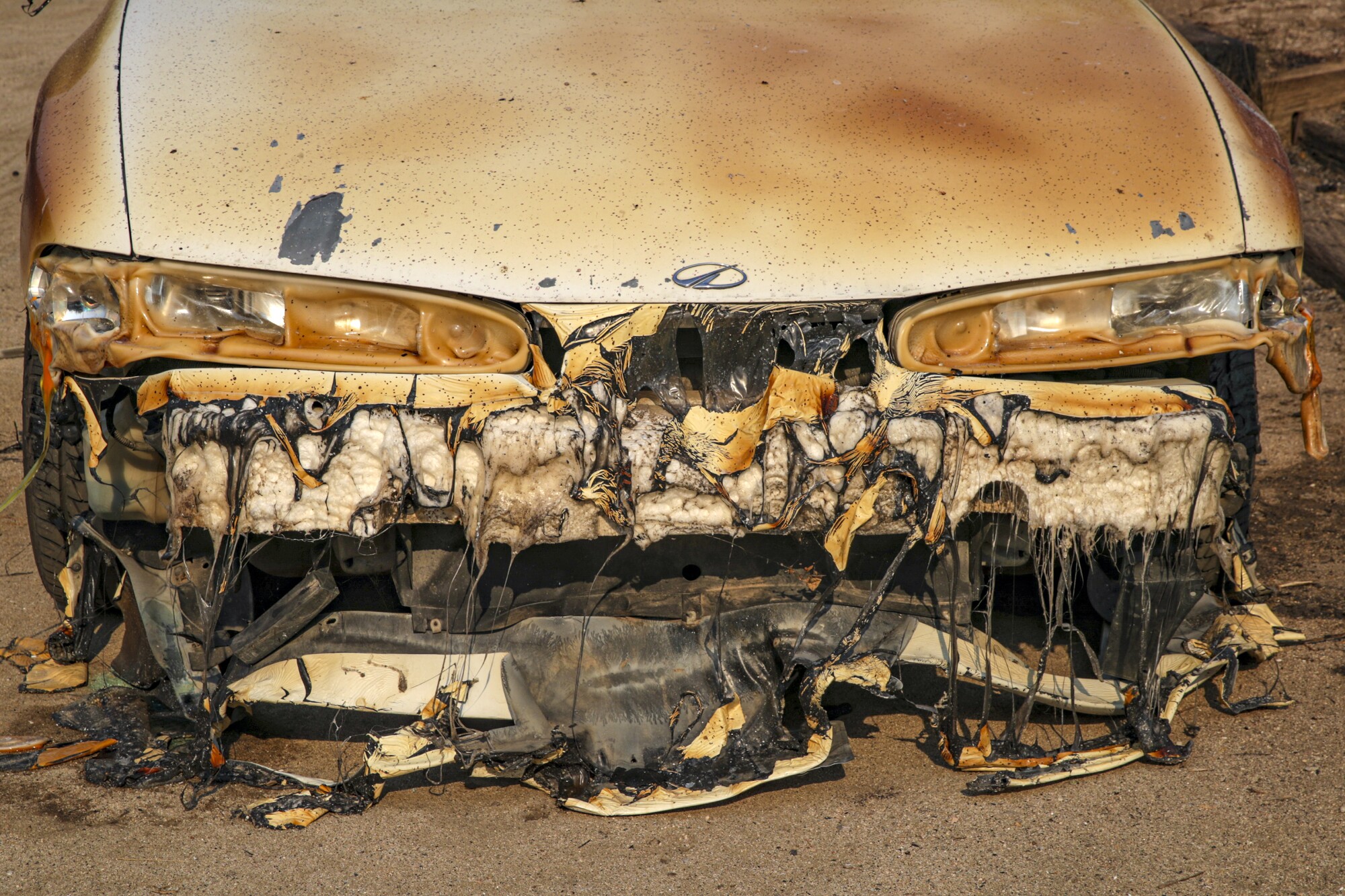 The front of a car on Gibble Road melted in the heat of the Fairview fire