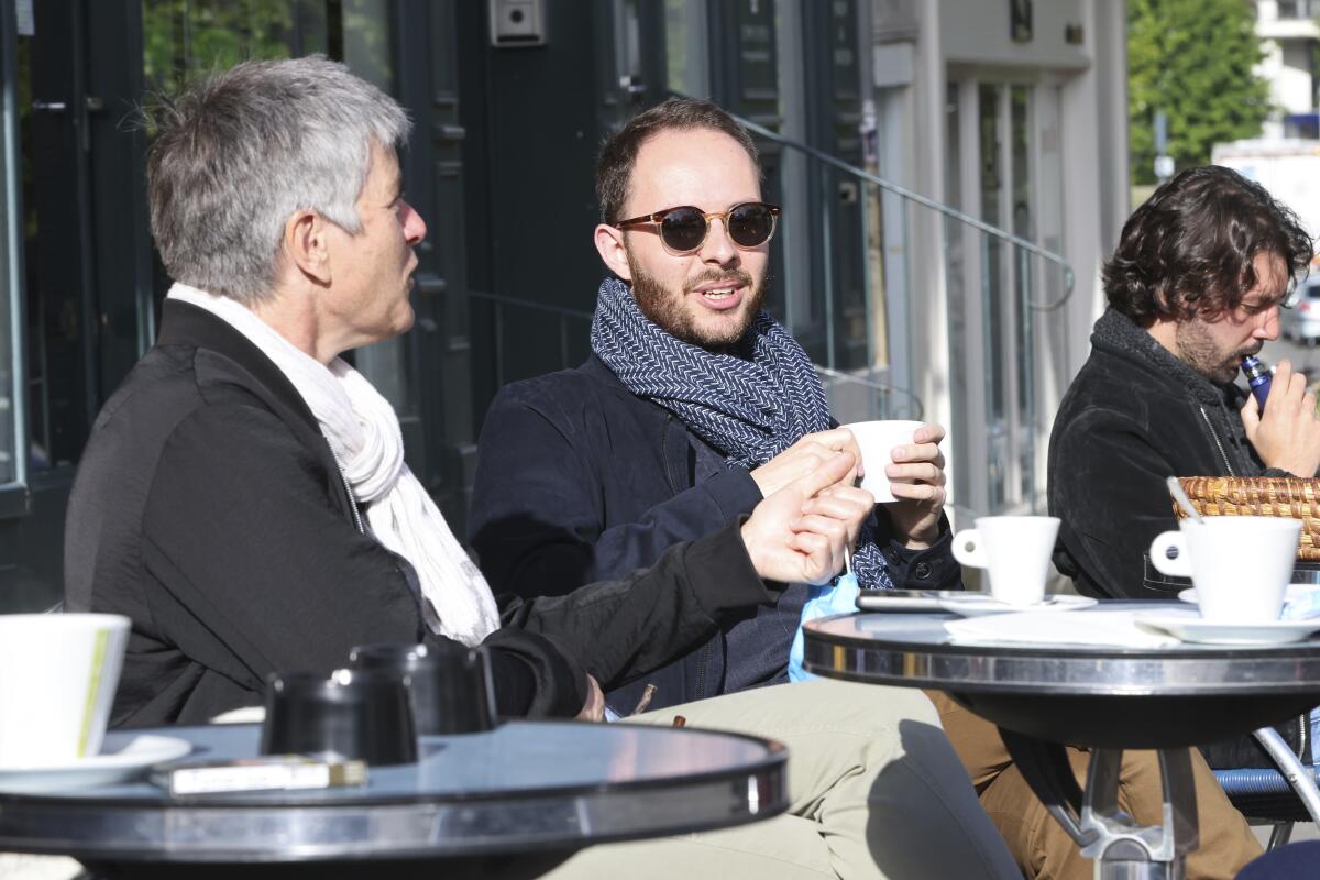 Customers at a cafe in France