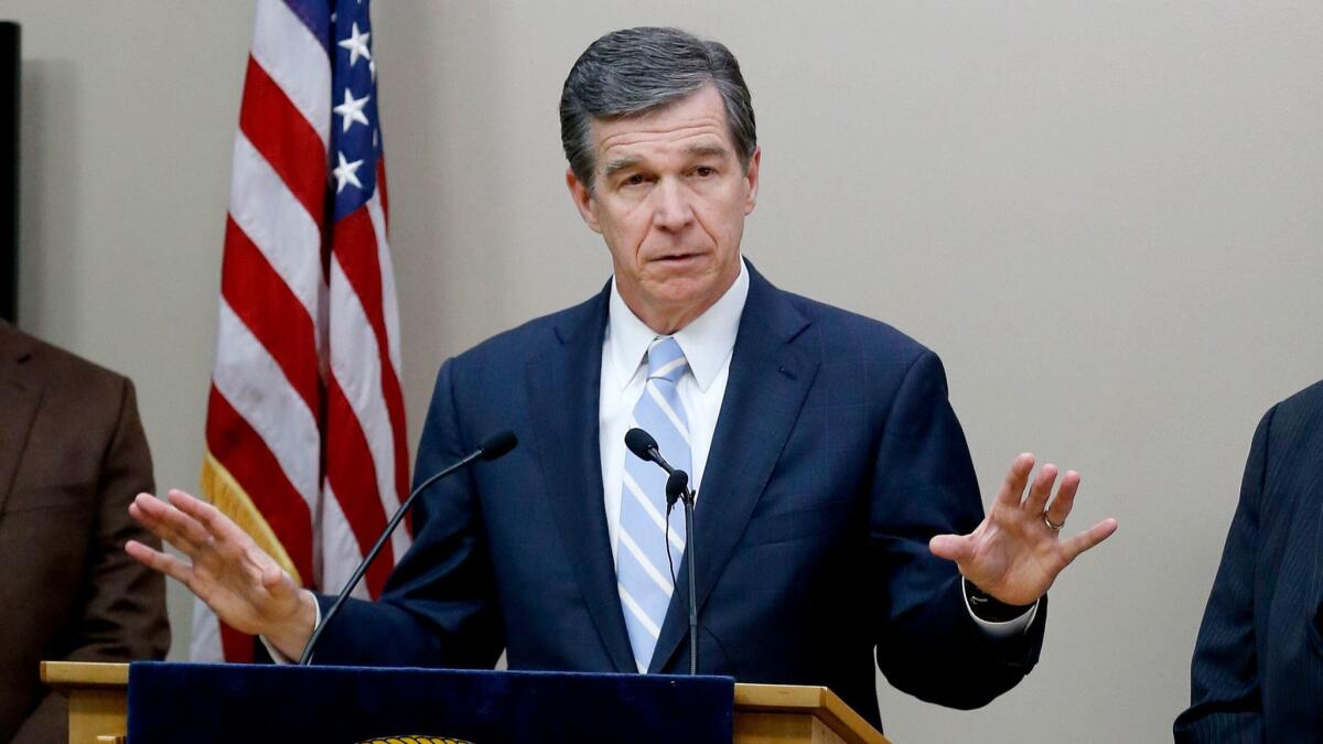 North Carolina Gov. Roy Cooper continues to battle with the Republican-controlled Legislature over new laws that stripped the governor's office of many powers.