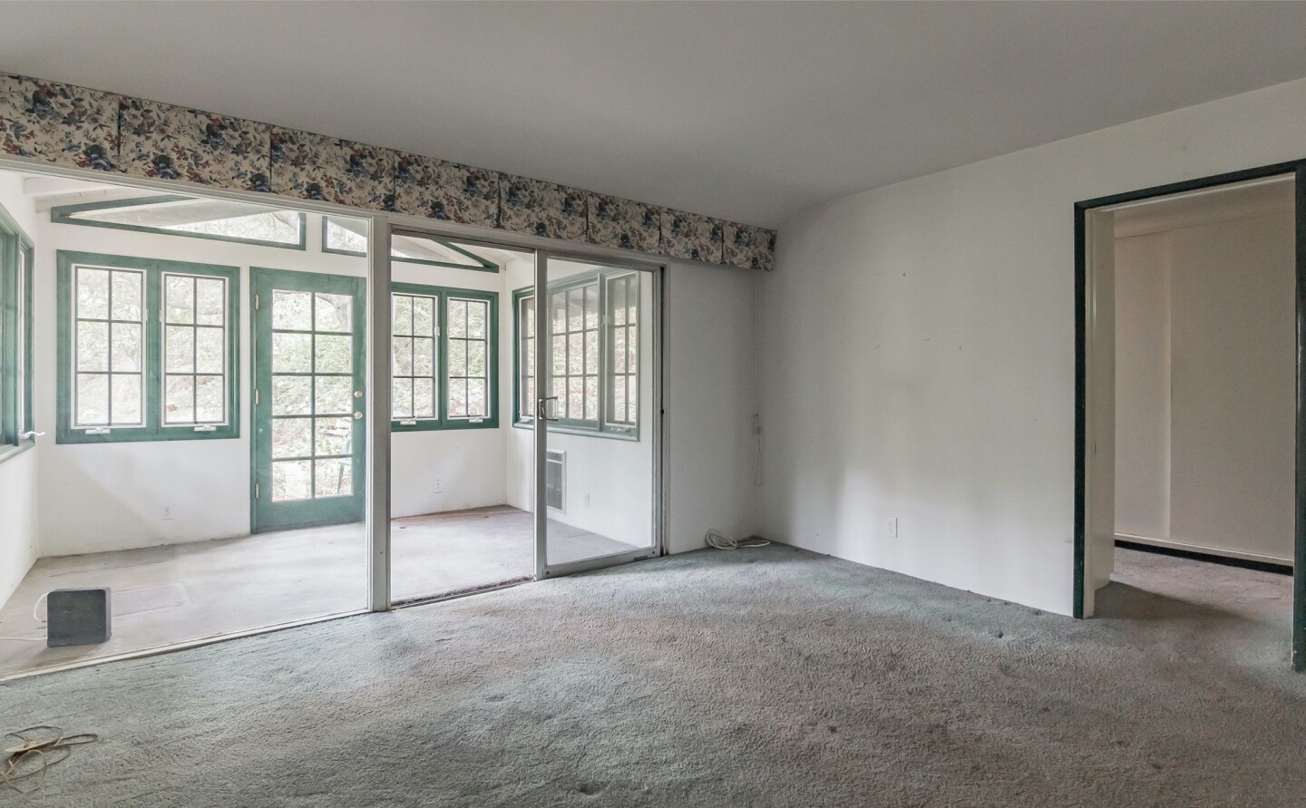 Built in 1955 and never renovated, the single-story home is tucked into a leafy lot near Sullivan Canyon Park.