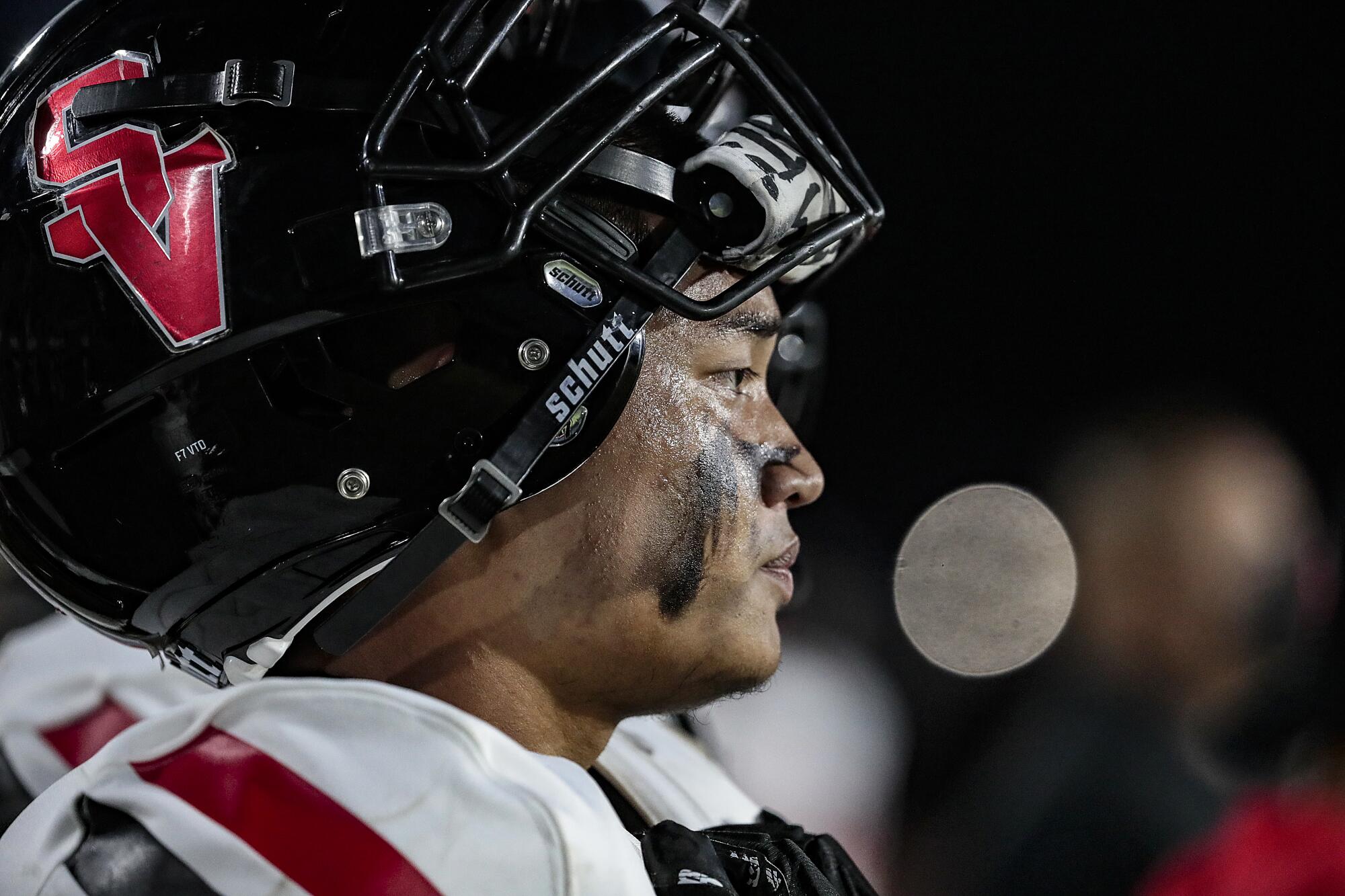 Johnny Sen looks on from the sideline during his last game with the Sierra Vista High Dons.