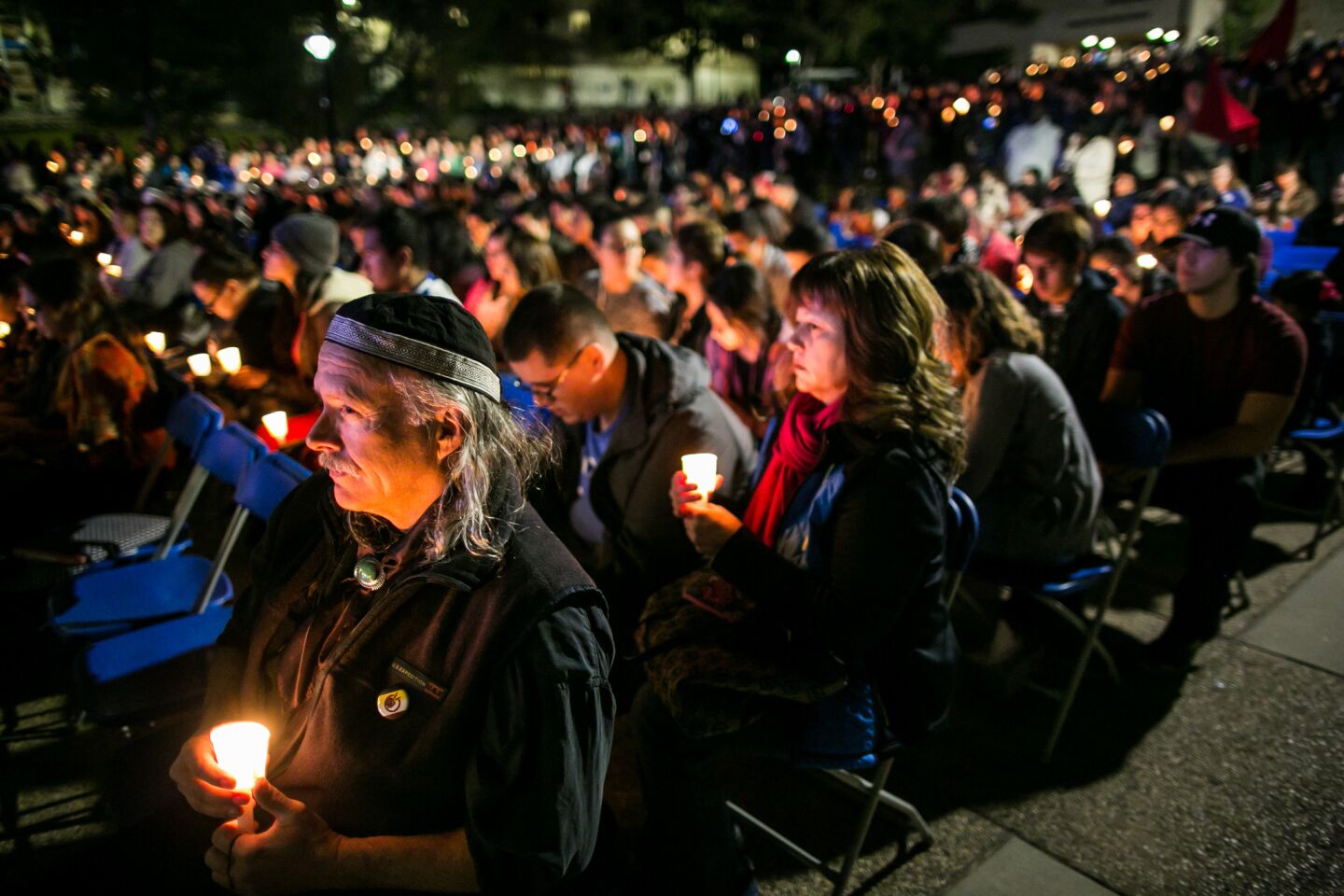 Community members and students gather for a Dec. 7 vigil on the Cal State San Bernardino campus to remember the victims of the deadly attack in the city.
