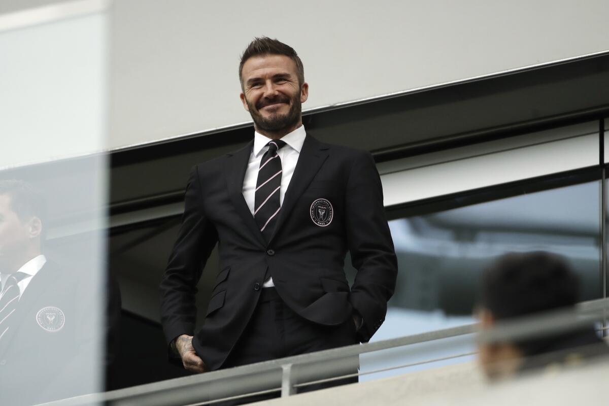 ARCHIVO - David Beckham observa desde las gradas previo al partido de la MLS 