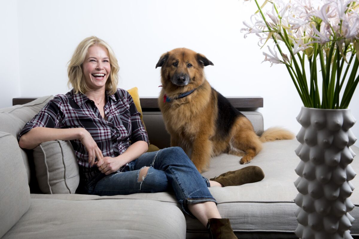 "Once I turned 40, my whole life changed in the most mature -- not boring way but much cooler way," says Chelsea Handler, relaxing with one of her dogs, Chunk.