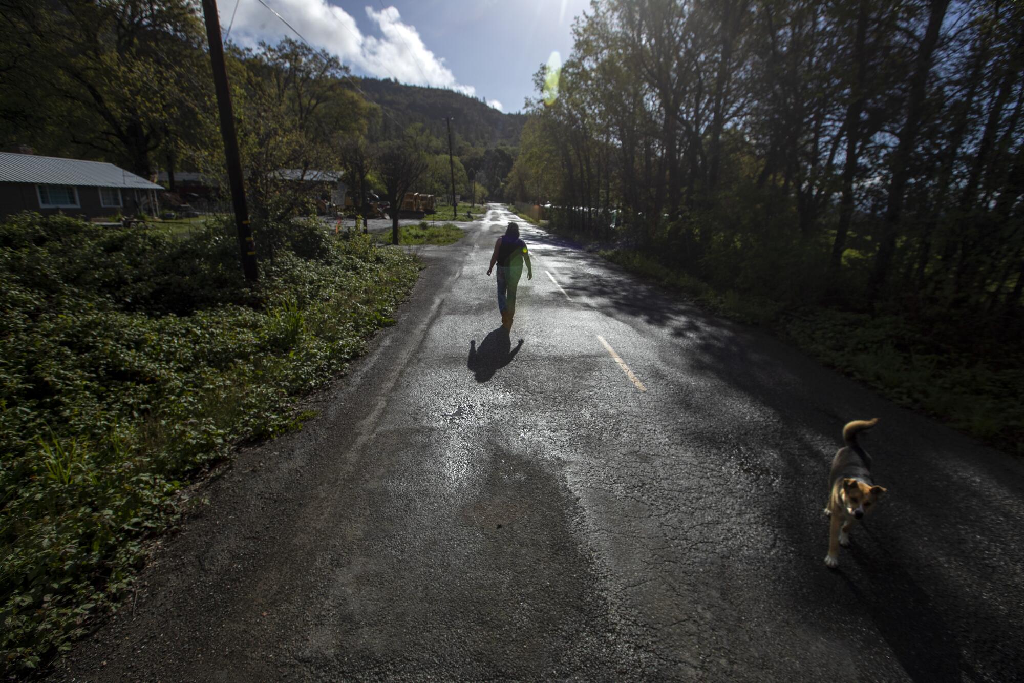 Round Valley Indian Tribes program managers Kat Willits walks down a country lane in Covelo.