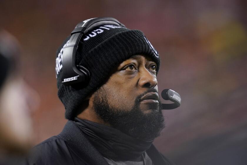 Pittsburgh Steelers head coach Mike Tomlin watches from the sideline during the first half of an NFL wild-card playoff football game against the Kansas City Chiefs, Sunday, Jan. 16, 2022, in Kansas City, Mo. (AP Photo/Ed Zurga)