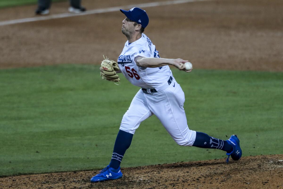 Dodgers relief pitcher Adam Kolarek delivers during the sixth inning.