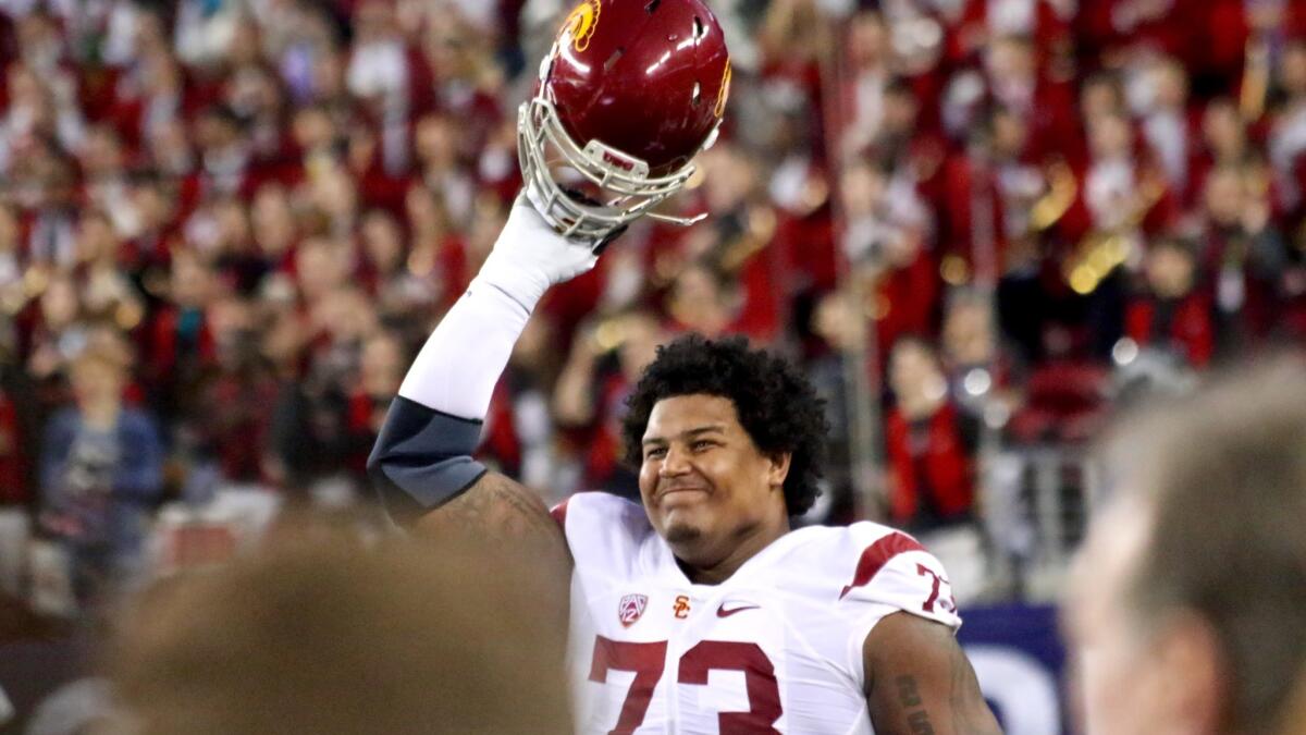 USC offensive tackle Zach Banner acknowledges the crowd before the Pac-12 Championship game at Levi's Stadium in Santa Clara, Calif.
