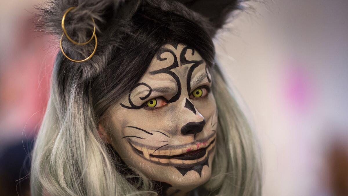 Tabitha Sheehan wears cat makeup at CatConLA.