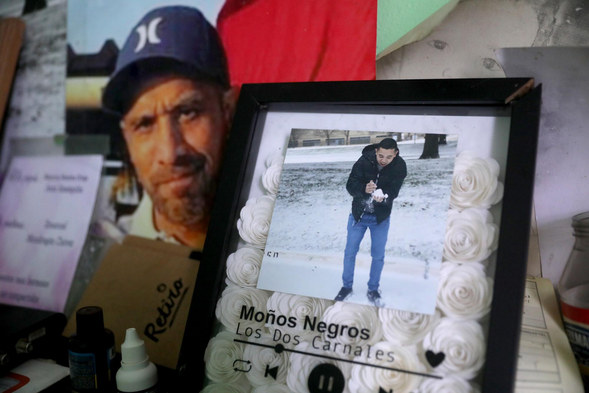 Photos of Ulises Ayala Andrade, left, and Chino on display in the family home outside Pátzcuaro.