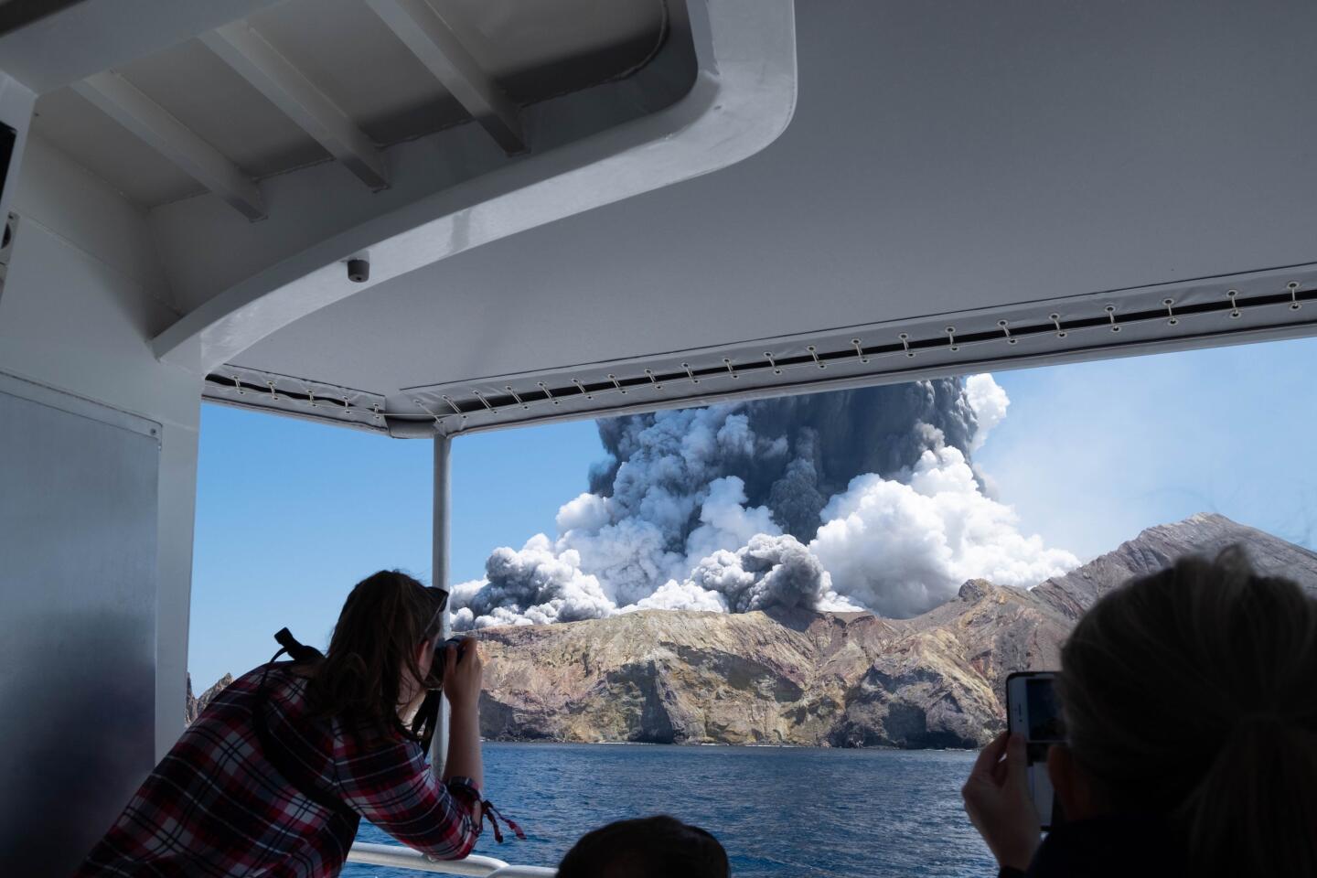 Editorial use only. MANDATORY CREDIT: MICHAEL SCHADE /NO SALES Mandatory Credit: Photo by MICHAEL SCHADE/EPA-EFE/REX (10495187b) An image provided by visitor Michael Schade shows White Island (Whakaari) volcano, as it erupts, in the Bay of Plenty, New Zealand, 09 December 2019. According to police, at least five people have died in the volcanic erruption at around 2:11 pm local time on 09 December. The island is located around 40km offshore of the Bay of Plenty. New Zealand's White Island volcano erupts - 09 Dec 2019 ** Usable by LA, CT and MoD ONLY **