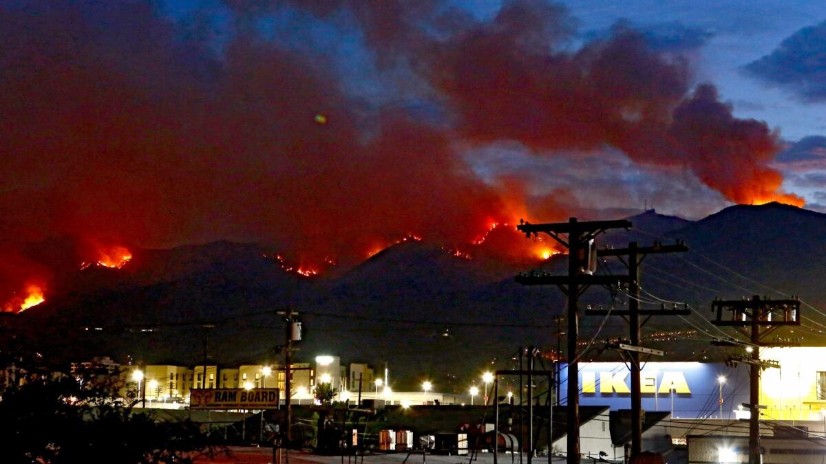 Fire rages in the Verdugo Hills above Burbank early in the morning on Saturday Sept. 2, 2017.