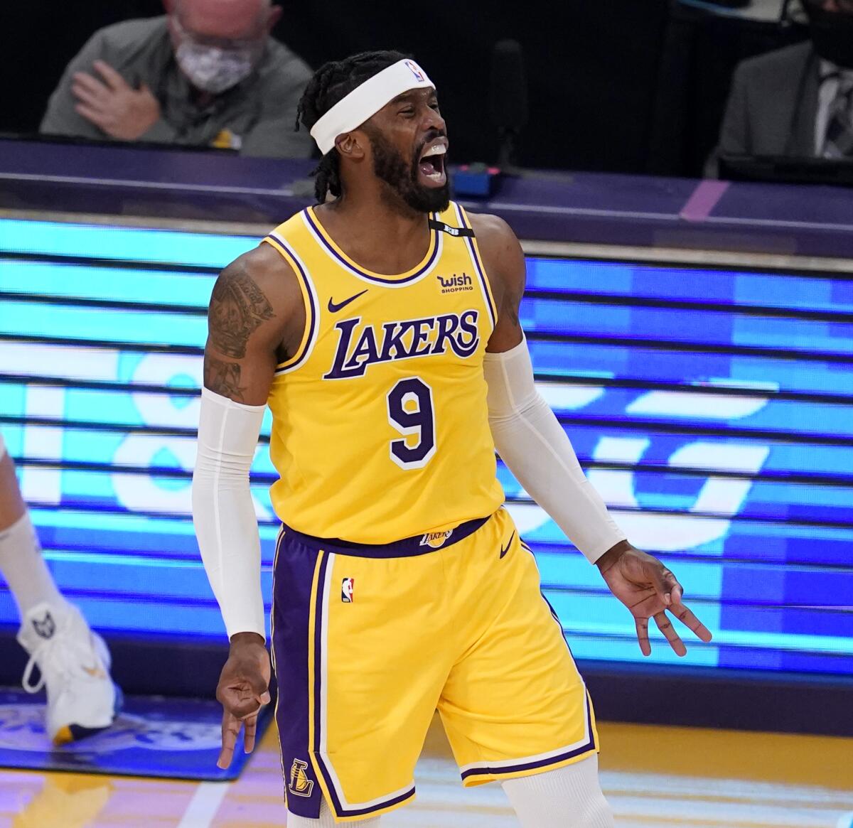 The Lakers' Wesley Matthews celebrates after making a three-pointer against the Phoenix Suns on May 27, 2021.