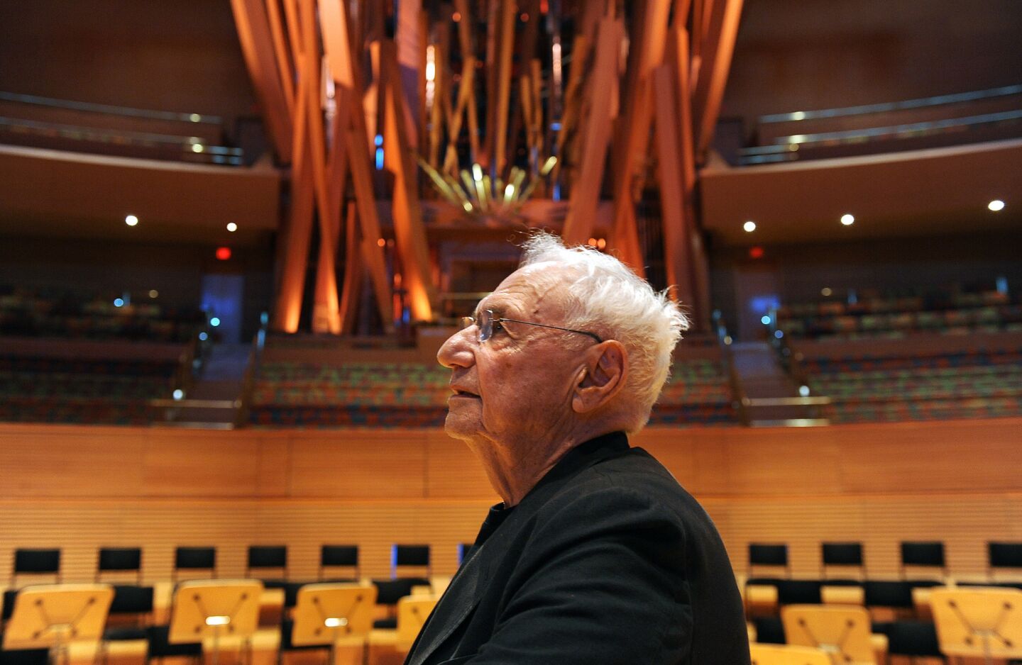 Architect Frank Gehry stands inside Walt Disney Concert Hall, a structure he designed, in downtown Los Angeles.