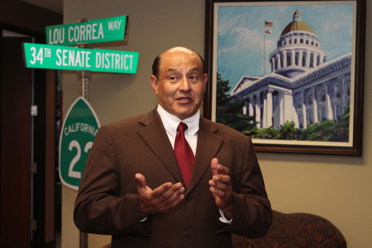 State Sen. Lou Correa (D-Santa Ana), shown in his office in 2012, has had to make a change to a campaign finance bill to gain Republican support.