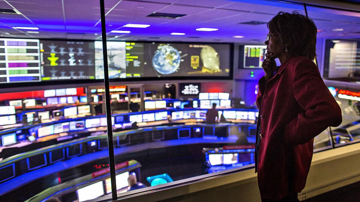 Claudia Alexander, on the view deck of mission control at the Jet Propulsion Laboratory, was the project scientist overseeing NASA's support role in the European Space Agency's Rosetta mission.