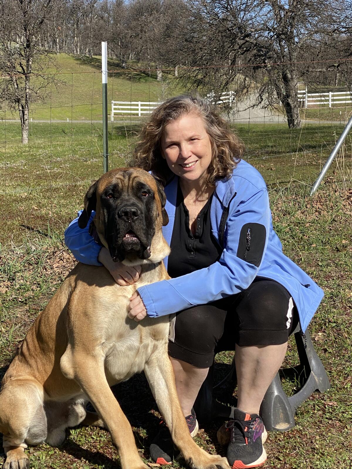 Cheri McKinzie with her 18-month-old English Mastiff puppy