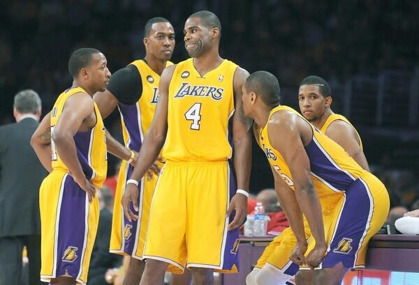 Antawn Jamison (4) talks with teammates Chris Duhon, Dwight Howard, Metta World Peace and Darius Morris during Game 3 of the Lakers first-round playoff series against the San Antonio Spurs at Staples Center.