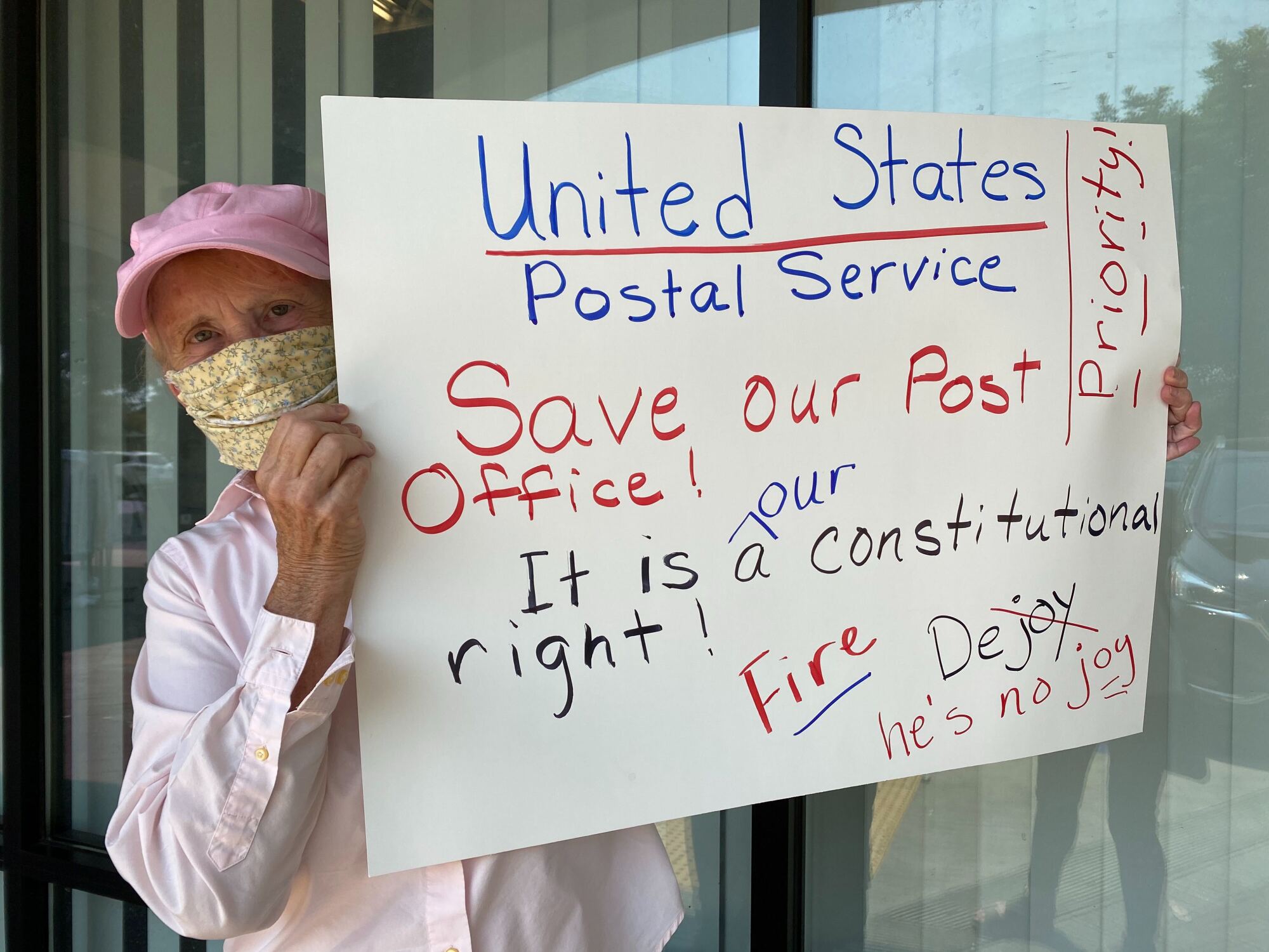 Ola Steenhagen protests outside the Granada Hills post office