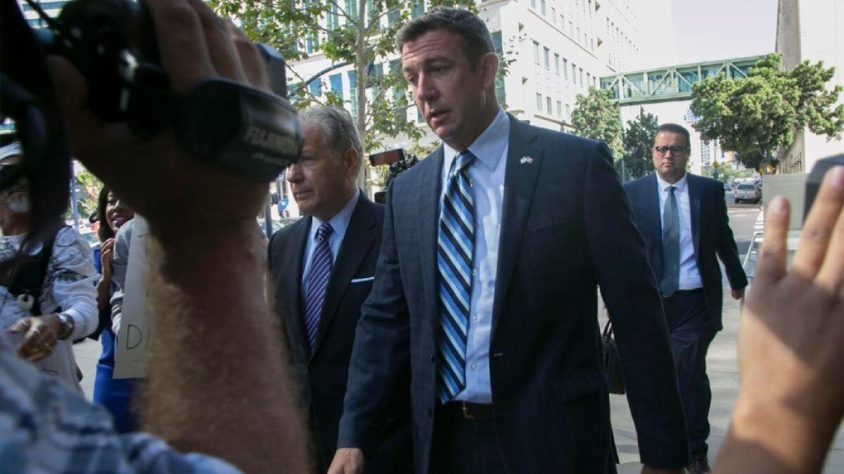 Rep. Duncan Hunter (R-Alpine) walks into the federal courthouse in San Diego for his arraignment on charges that he and his wife misused $250,000 in campaign contributions.
