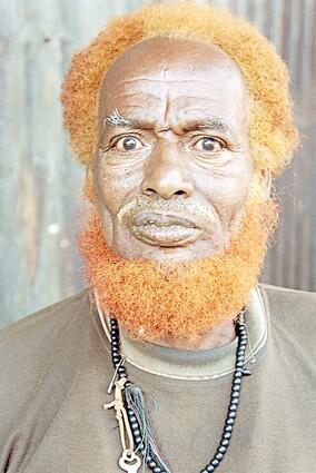 This man with bushy red hair and beard was a vendor at a market in Dire Dawa, a dusty, dreary town about an hour's drive from Harar in Ethiopia. He claimed, through an interpreter, that the hair color was natural.