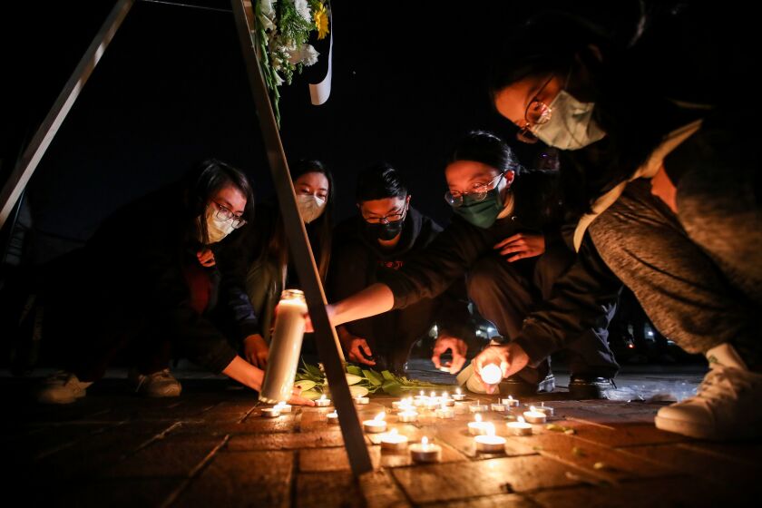 Monterey Park, CA - January 23: Mourners take part in a vigil for the victims of a mass shooting at the Star Dance Studio on Monday, Jan. 23, 2023, in Monterey Park, CA. The investigation into a mass shooting in Monterey Park is focused on the gunman's prior interactions at two dance studios he targeted and whether jealousy over a relationship was the motive, law enforcement sources said.(Allen J. Schaben / Los Angeles Times)