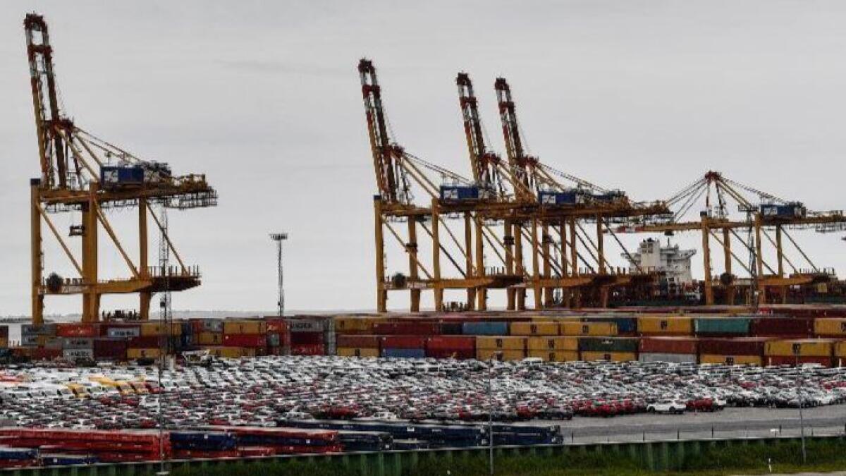 Cars for export and import are parked Thursday at the harbor in Bremerhaven, Germany, one of the largest automobile hubs in the world.