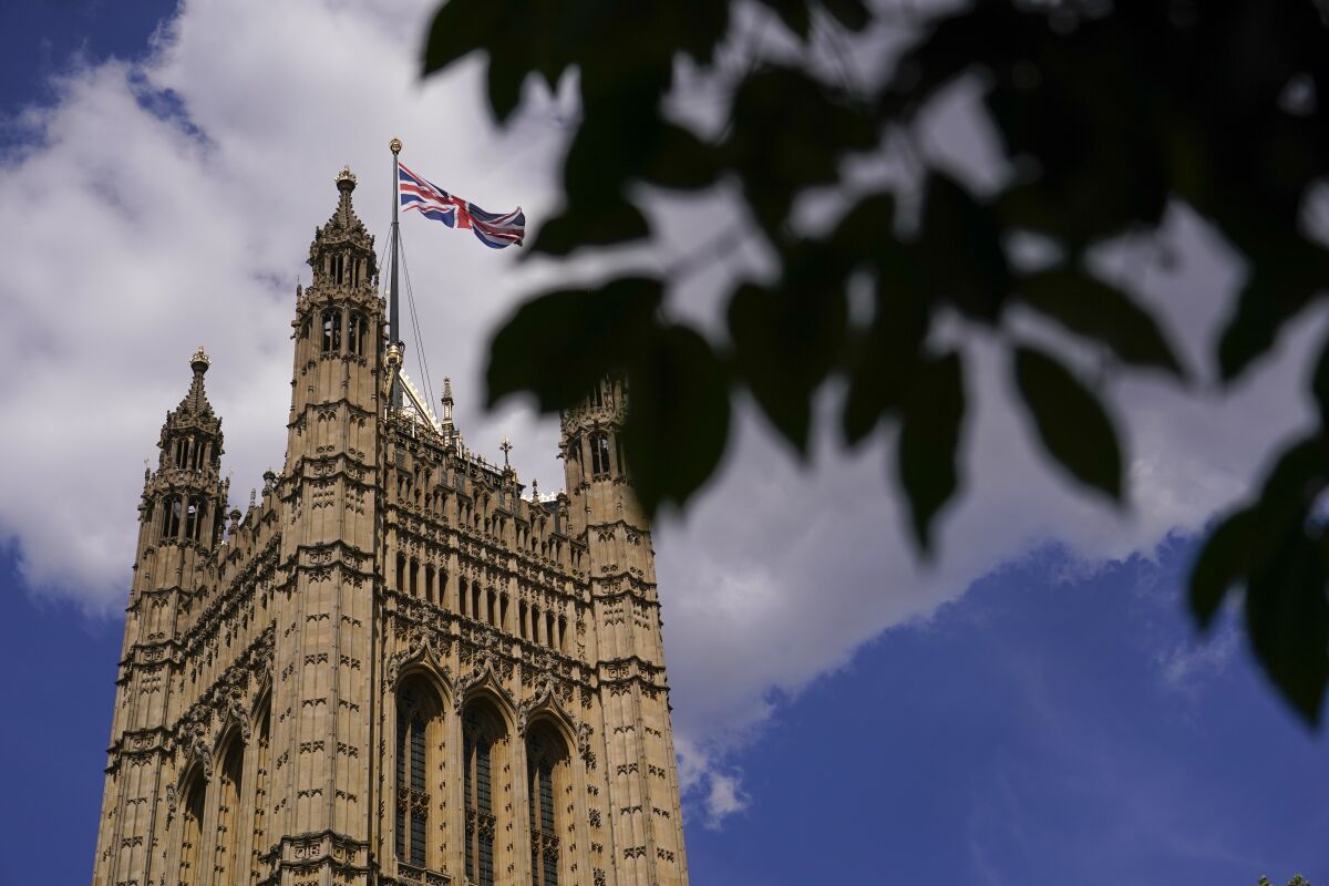 The Victoria Tower stands out in Westminster, London, Thursday, July 14, 2022. (AP Photo/Alberto Pezzali)