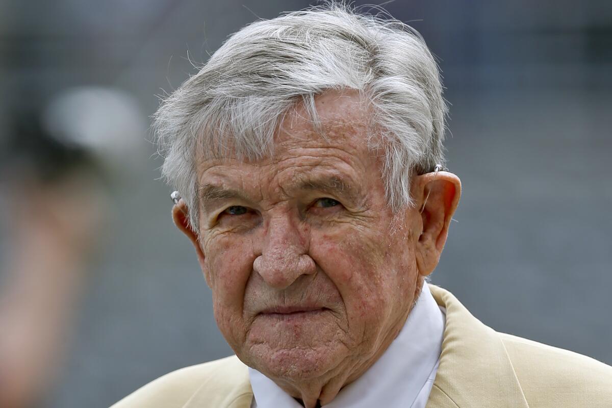 Former coach Johnny Majors heads to the field during Pittsburgh's annual Blue-Gold game on April 14, 2018.