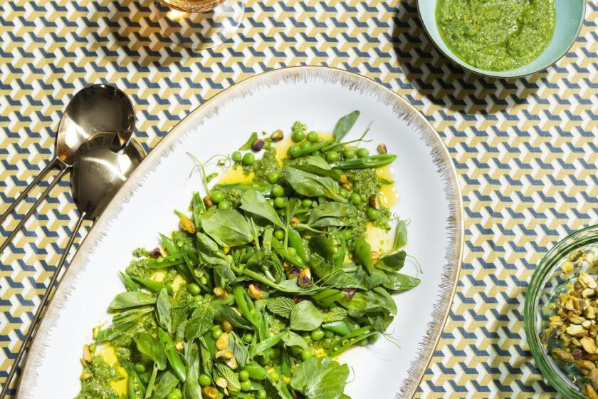 ONE TIME USE - QUEENS, NEW YORK - Apr 2, 2019 - Making Passover recipes by Adeena Sussman and various LA Chefs. SPRING PEA SALAD WITH PISTACHIOS by Chef Alex Chang.