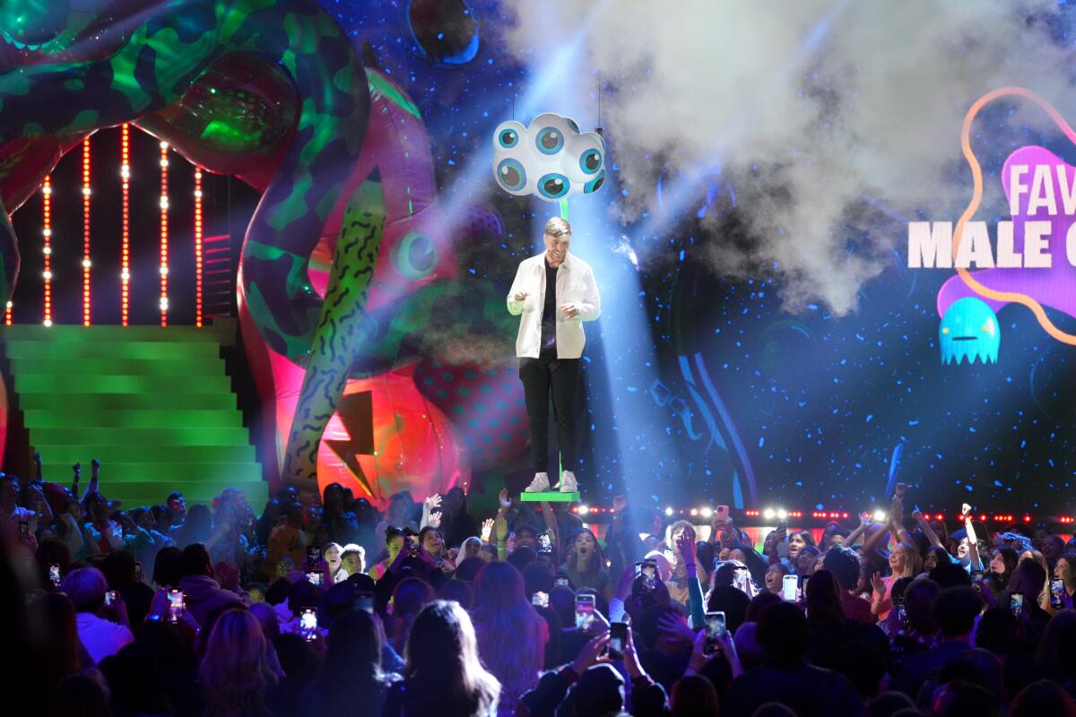 Mr. Beast speaks onstage during the 2023 Nickelodeon Kids' Choice Awards in Los Angeles.