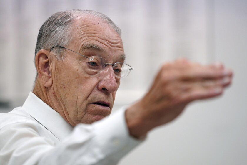 In this June 30, 2021, photo Sen. Chuck Grassley, R-Iowa, speaks during a meeting with employees at Professional Computer Solution, in Denison, Iowa. (AP Photo/Charlie Neibergall)