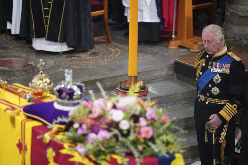 King Charles III during the funeral service of Queen Elizabeth II at Westminster Abbey in central London, Monday Sept. 19, 2022. The Queen, who died aged 96 on Sept. 8, will be buried at Windsor alongside her late husband, Prince Philip, who died last year. (Dominic Lipinski/Pool via AP)