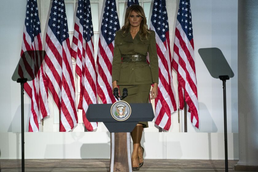 First lady Melania Trump arrives to speak to the 2020 Republican National Convention from the Rose Garden of the White House, Tuesday, Aug. 25, 2020, in Washington. (AP Photo/Evan Vucci)