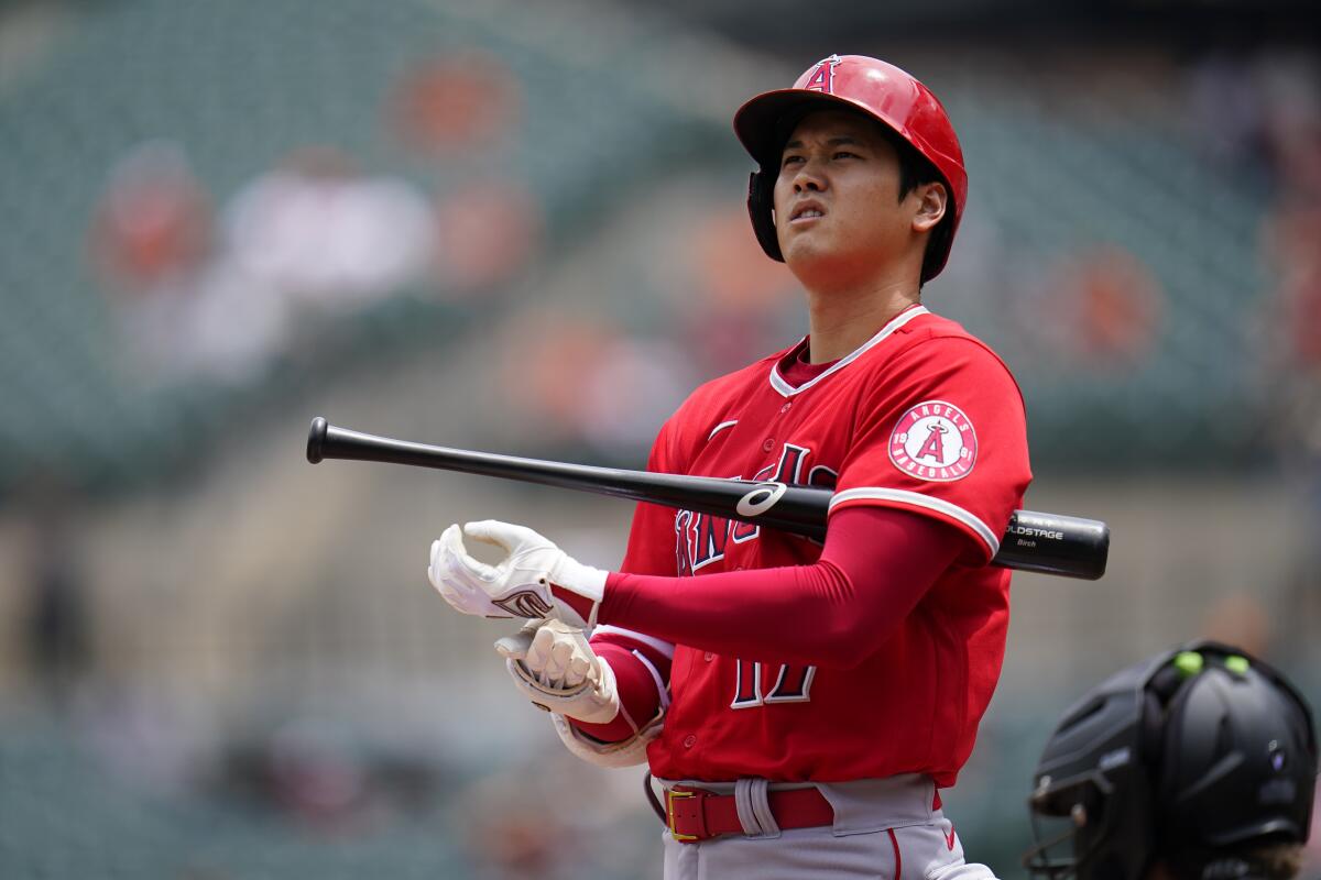 Angels star Shohei Ohtani looks on during an at-bat against the Baltimore Orioles.