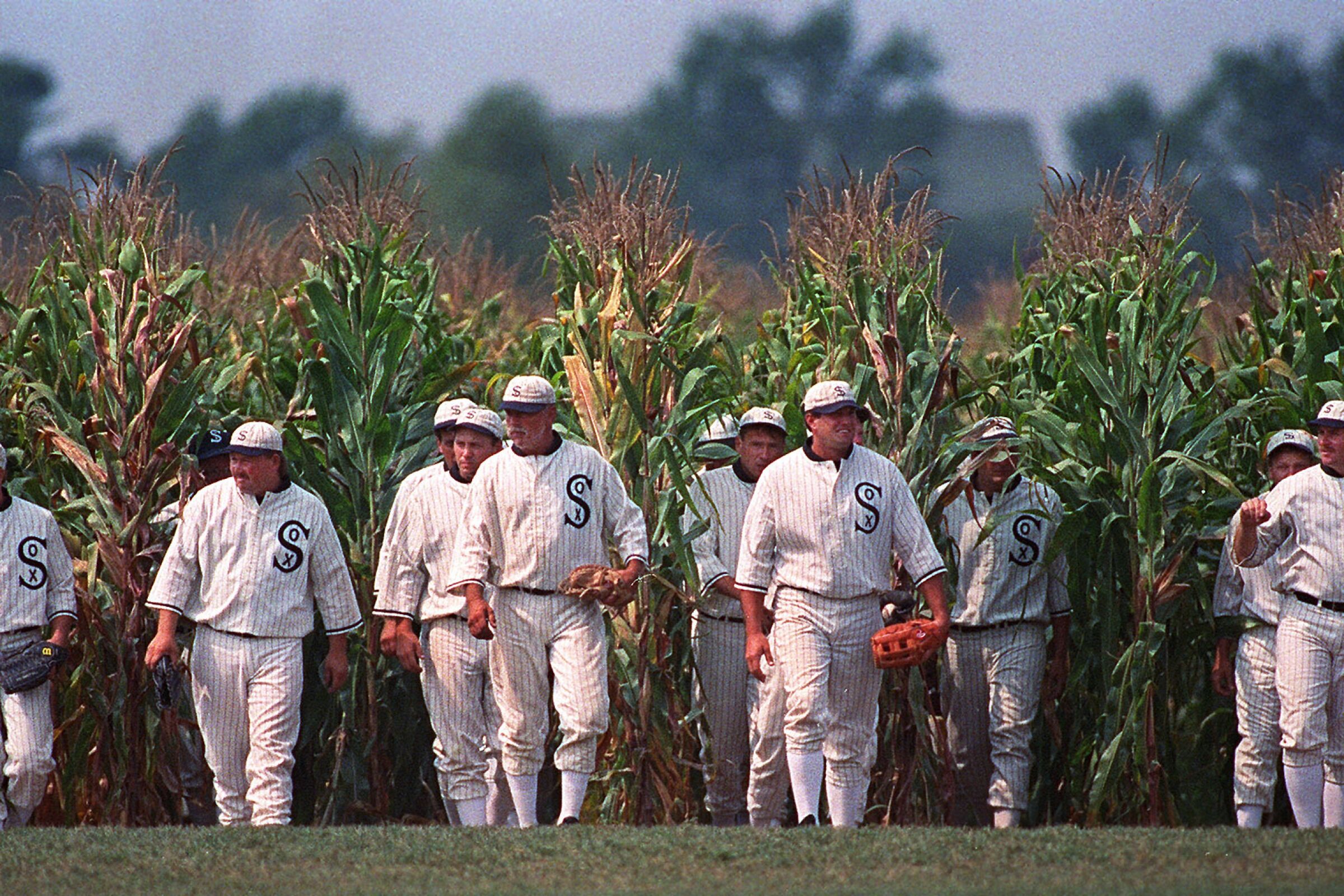 Actors portraying ghost baseball players emerge from the cornfield at the "Field of Dreams" movie site in Iowa. 