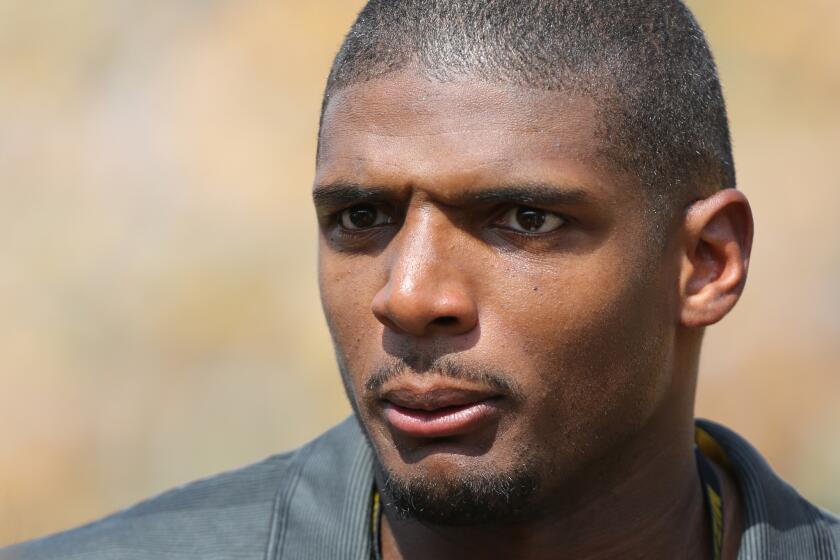 Michael Sam attends a Missouri-South Dakota State football game in Columbia, Mo., on Aug. 30.