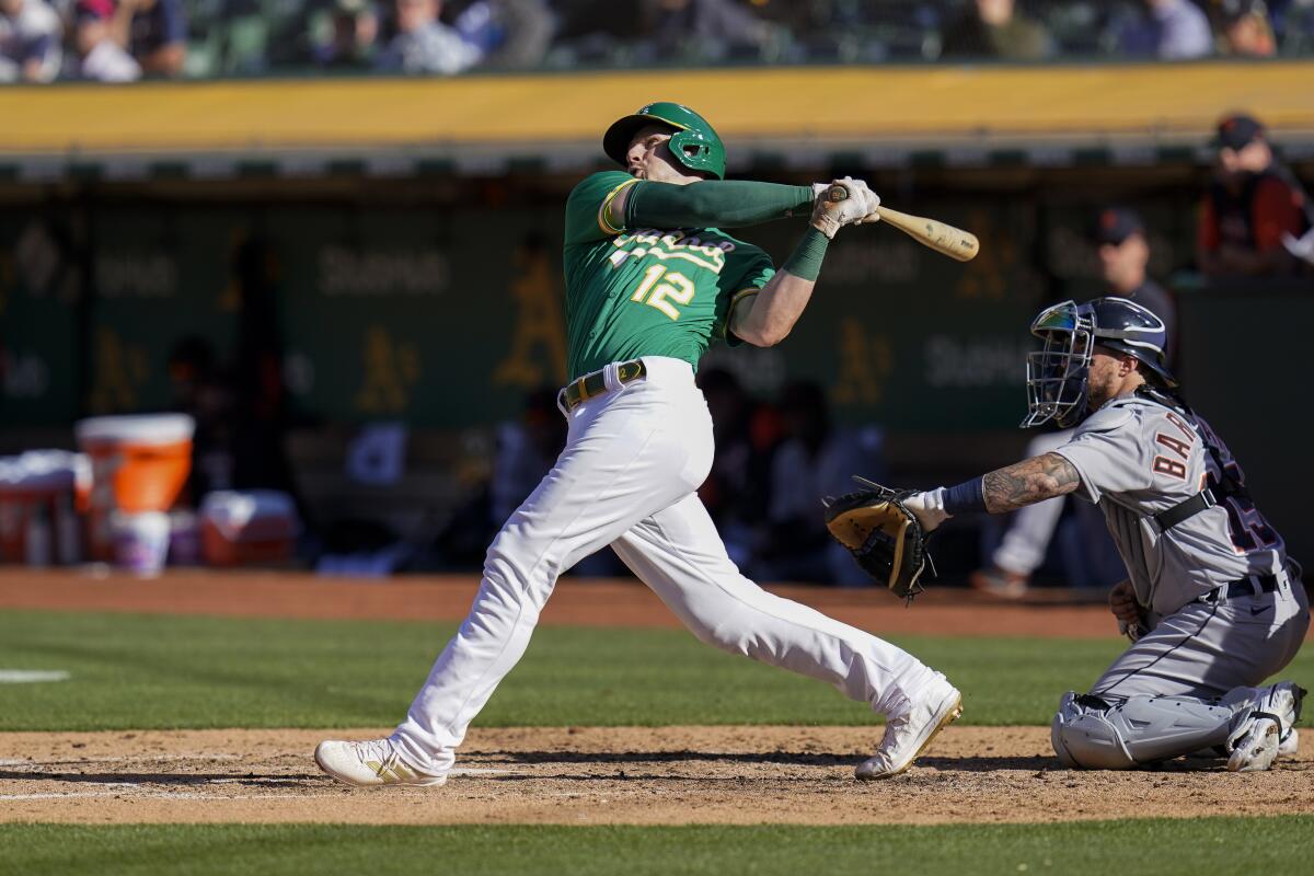 Oakland Athletics' Sean Murphy follows through on a three-run home run against the Detroit Tigers during the sixth inning of the second baseball game of a doubleheader in Oakland, Calif., Thursday, July 21, 2022. (AP Photo/Godofredo A. Vásquez)