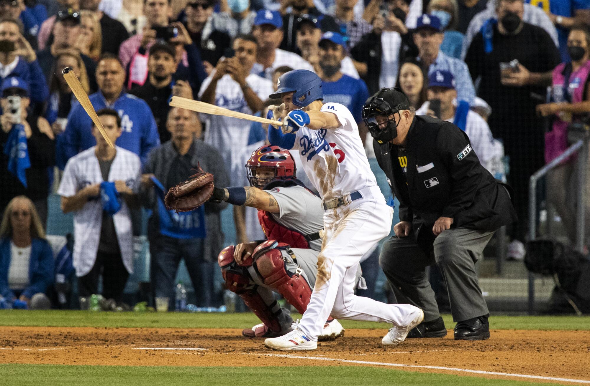 Los Angeles Dodgers shortstop Trea Turner breaks his bat