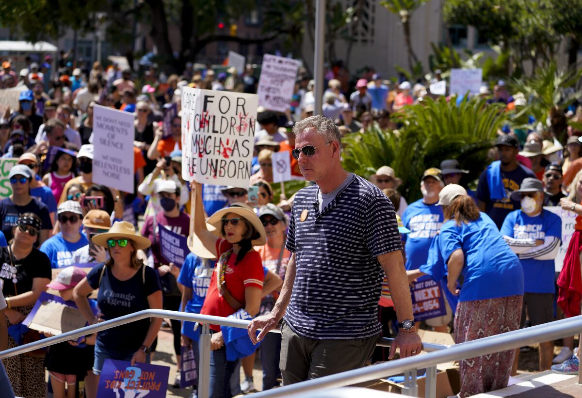 Rep. Scott Peters was among the hundreds of demonstrators who took part in Saturday's rally.