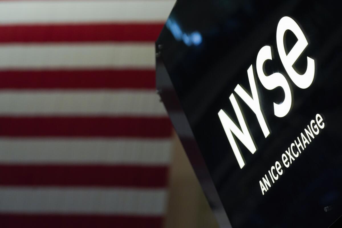 An NYSE sign is seen on the floor at the New York Stock Exchange.