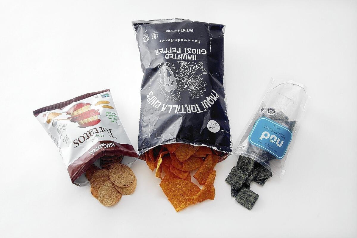 Tortatos, lelft, Paqui Tortilla Chips and Nud's green energy crisps are among the items showcased at the expo.
