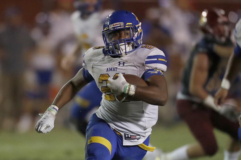 MISSION HILLS, CALIF. - SEP. 27, 2019. Bishop Amat running back Damien Moore takes the ball to the end zone against Alermany in the third quarter at Alemany High on Friday night, Oct. 4, 2019. (Luis Sinco/Los Angeles Times)