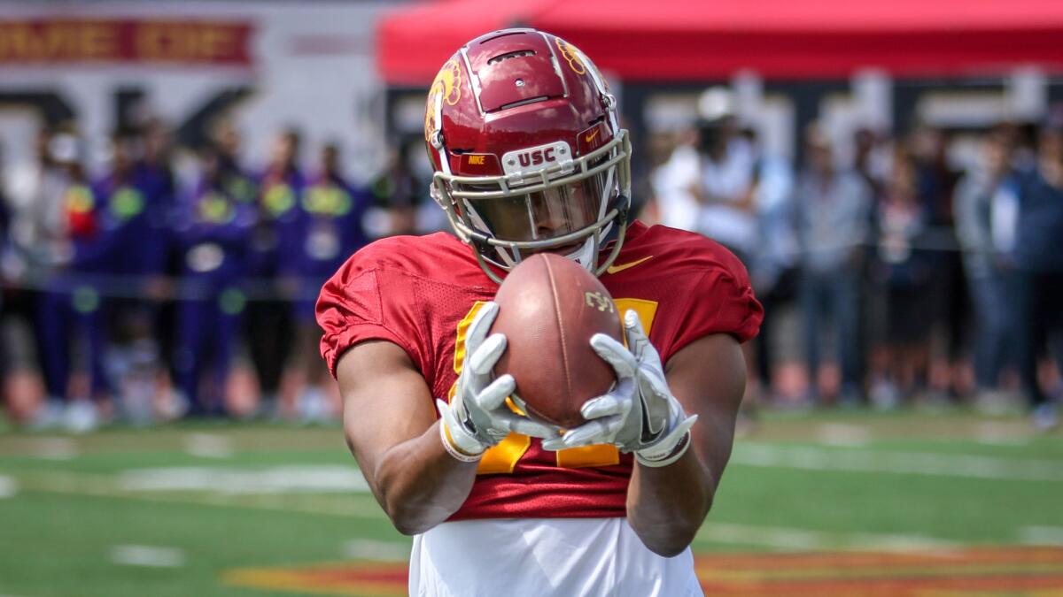 USC receiver John Jackson III looks a pass in during a drill at the Trojans' spring showcase on April 6, 2019.