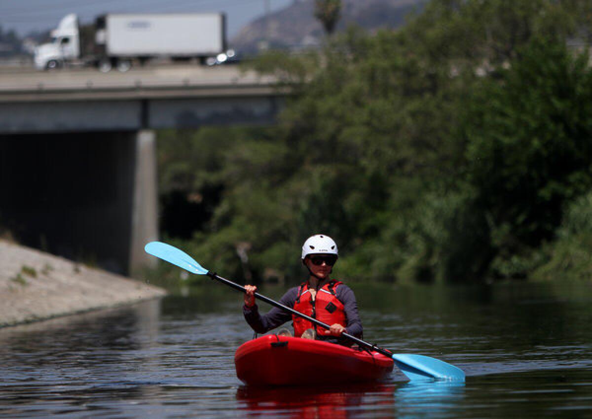 Agnieszka Pietruszkiewicz, 27, of Los Angeles, kayaks on the LA River, near Marsh Park on the Los Angeles River.