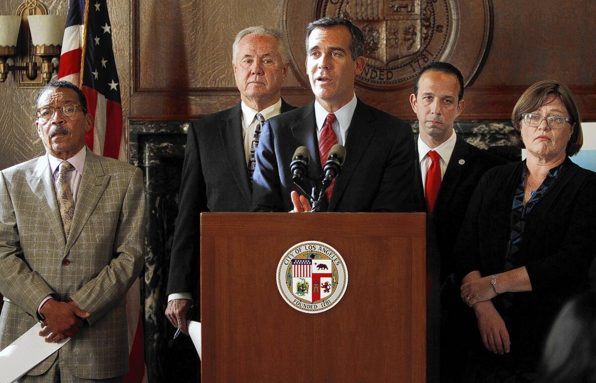 From left, L.A. City Council President Herb Wesson, Councilman Tom LaBonge, Mayor Eric Garcetti and Councilman Mitchell Englander join seismologist Lucy Jones during a news conference to announce a new city quake-preparedness effort.