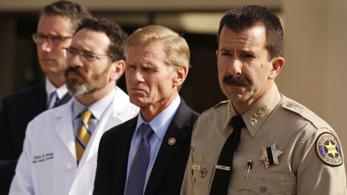 Ventura County Sheriff Bill Ayub, right, with Ventura District Attorney Gregory Totten, Ventura County Chief Medical Examiner Dr. Christopher Young and Paul Delacourt, assistant director in charge of the FBI's Los Angeles Field Office, at the Borderline shooting press conference.