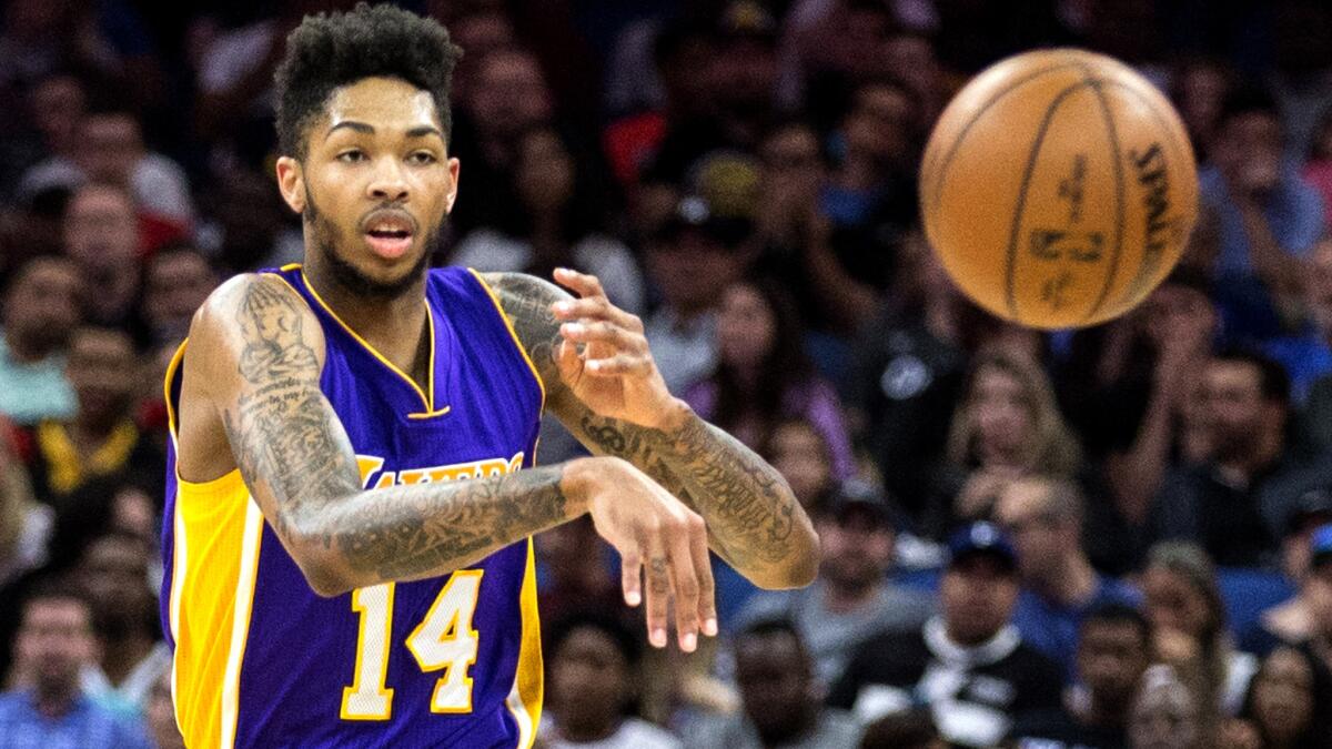 Lakers forward Brandon Ingram passes the ball during the first half Friday night.