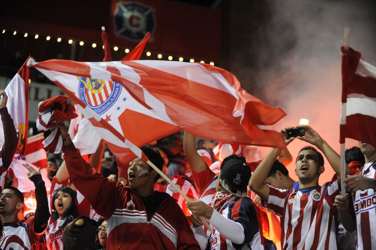 Chivas of Guadalajara fans cheer on their team during an exhibition against the Chicago Fire.